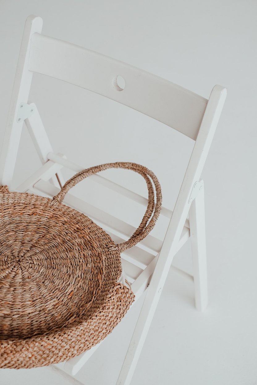 Wicker Bag on a White Chair